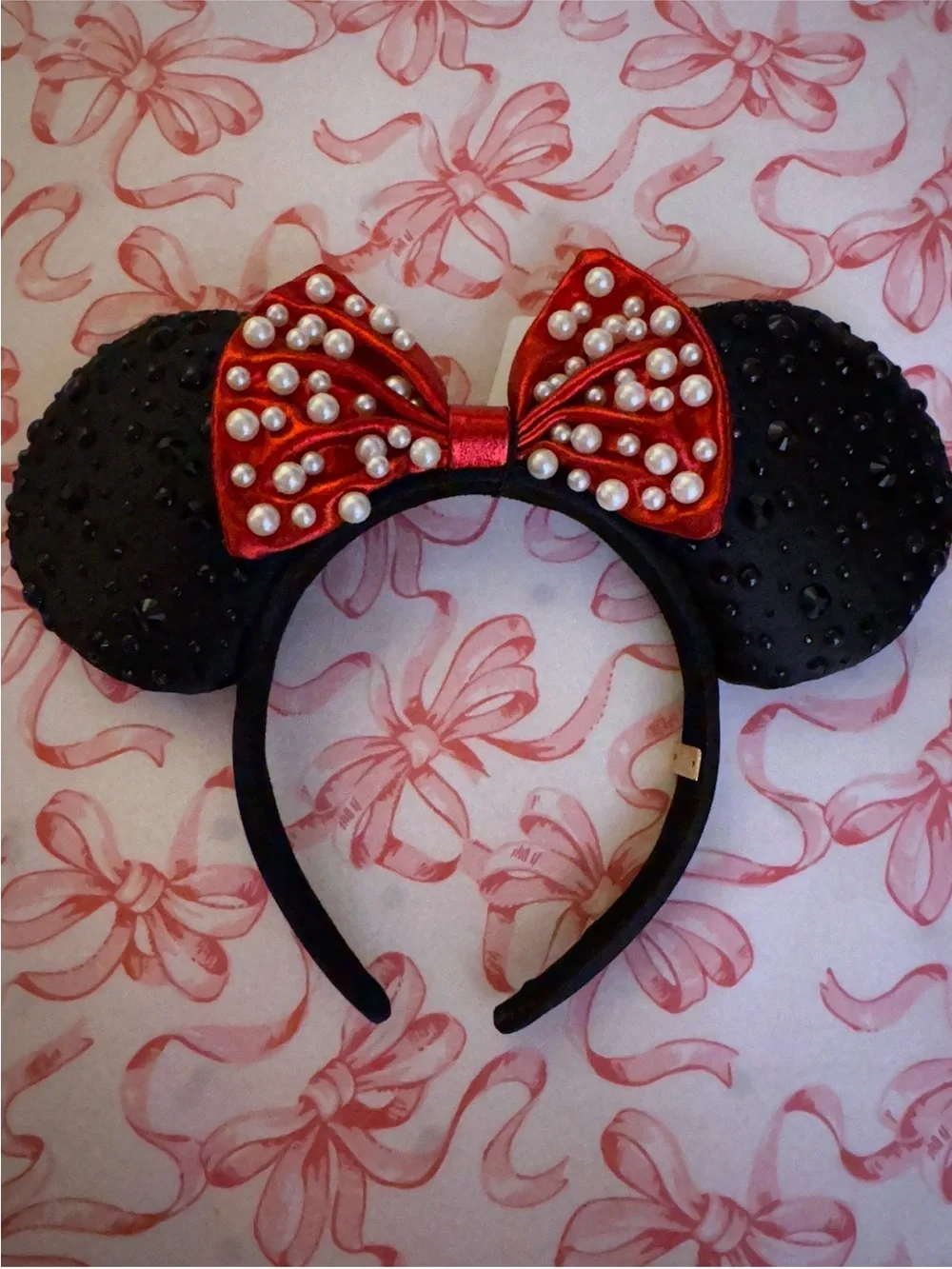 BaubleBar Black Sequin Ear Headband with Red Pearl-Stud Bow